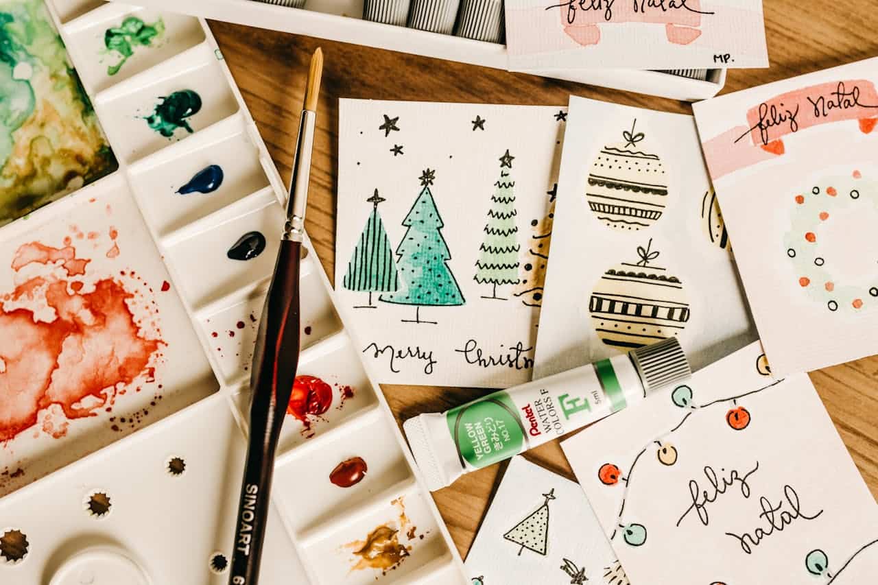 Many DIY painted christmas cards