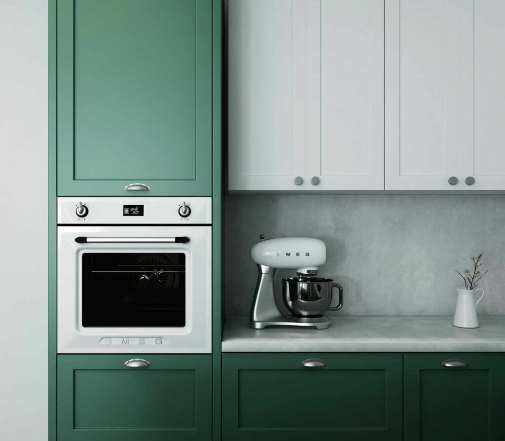 small kitchen with an electric oven and a white smeg mixer