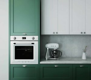 small kitchen with an electric oven and a white smeg mixer